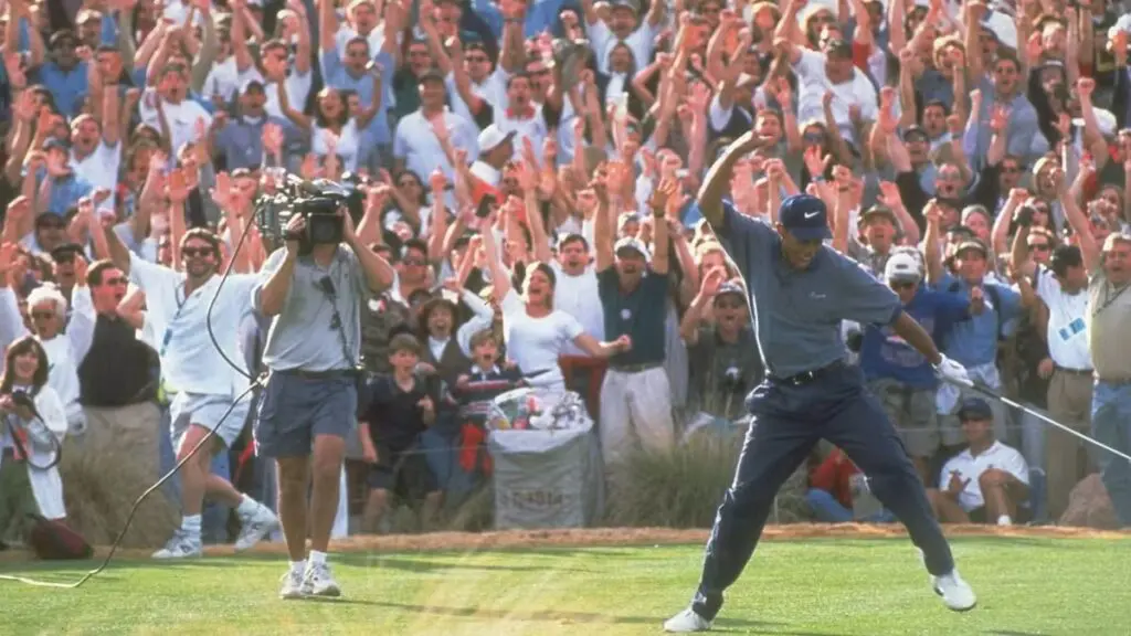 Tiger Woods’ 1997 ace reaction and crowd eruption.